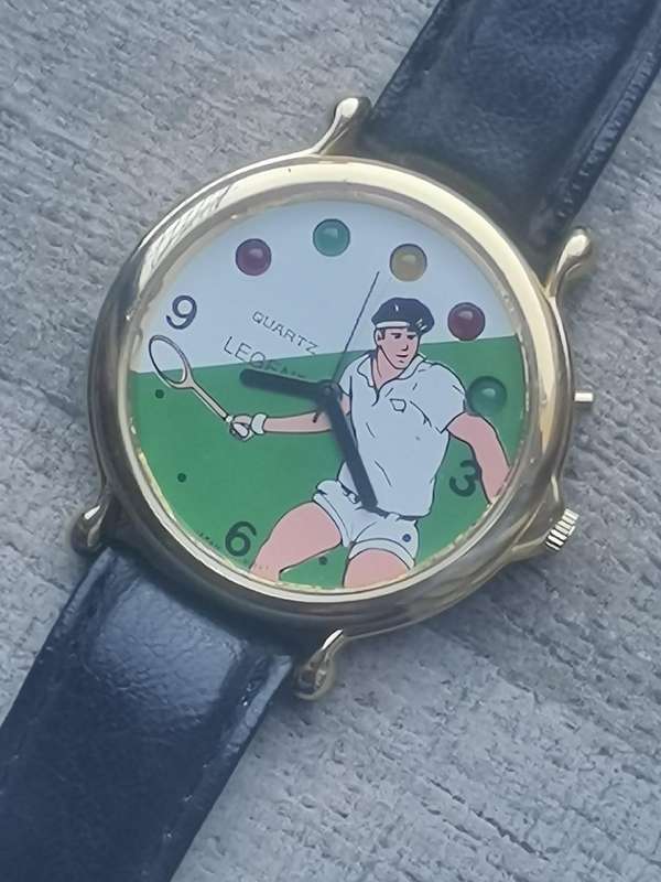 VINTAGE MENS LEGEND TENNIS WATCH WITH ROTATING COLOURFUL LIGHTS IN EXCELLENT WORKING CONDITION