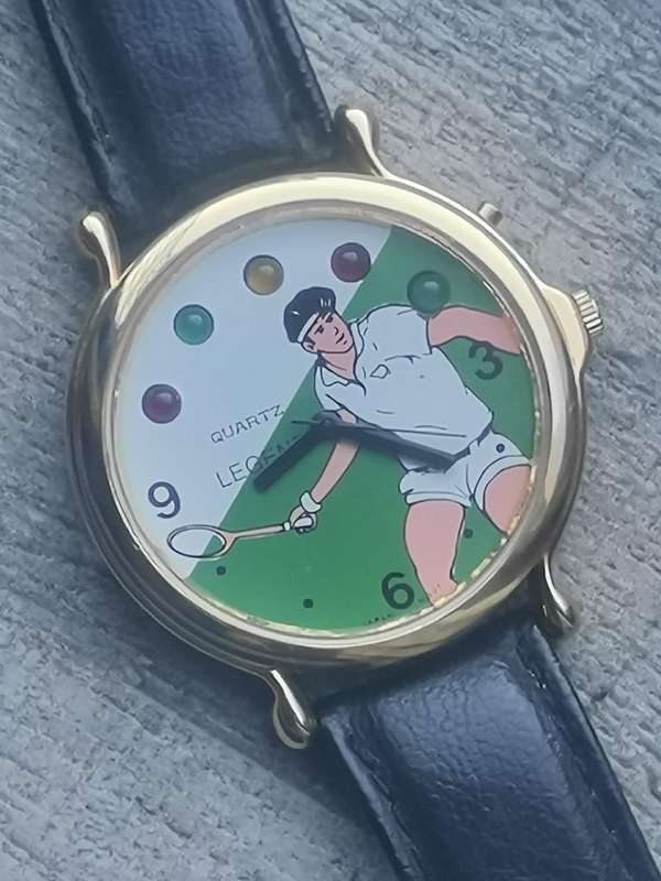 VINTAGE MENS LEGEND TENNIS WATCH WITH ROTATING COLOURFUL LIGHTS IN EXCELLENT WORKING CONDITION