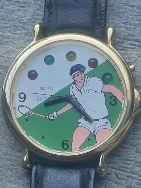 VINTAGE MENS LEGEND TENNIS WATCH WITH ROTATING COLOURFUL LIGHTS IN EXCELLENT WORKING CONDITION