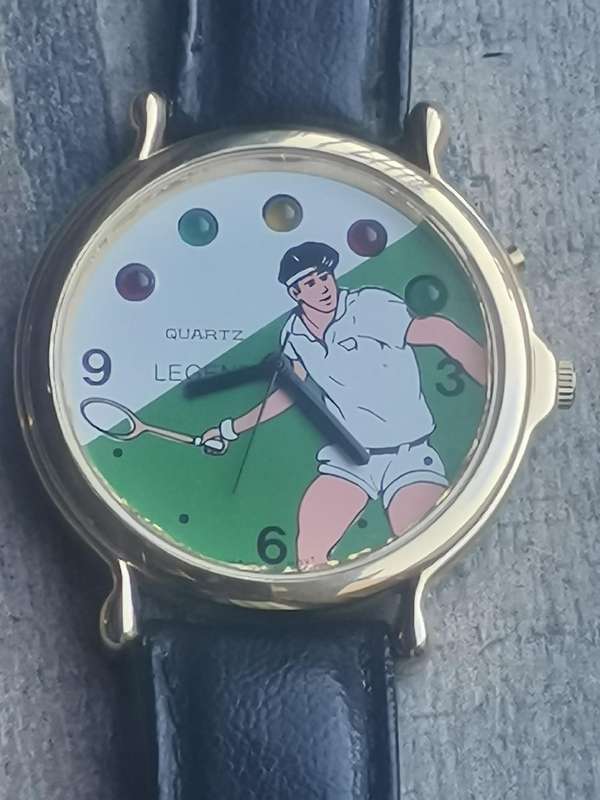 VINTAGE MENS LEGEND TENNIS WATCH WITH ROTATING COLOURFUL LIGHTS IN EXCELLENT WORKING CONDITION
