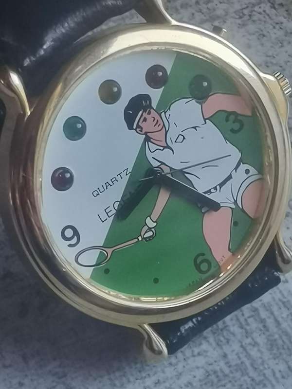 VINTAGE MENS LEGEND TENNIS WATCH WITH ROTATING COLOURFUL LIGHTS IN EXCELLENT WORKING CONDITION