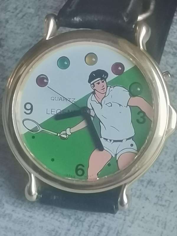 VINTAGE MENS LEGEND TENNIS WATCH WITH ROTATING COLOURFUL LIGHTS IN EXCELLENT WORKING CONDITION
