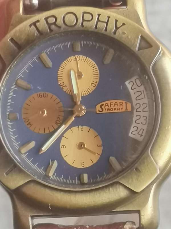 MENS TROPHY SAFARI WATCH WITH ROTATING BEZEL IN EXCELLENT WORKING CONDITION