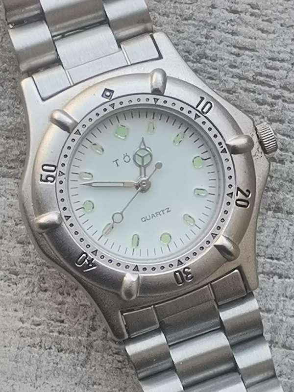 LADIES TORQ STAINLESS STEEL WATCH WITH ROTATING BEZEL IN EXCELLENT WORKING CONDITION