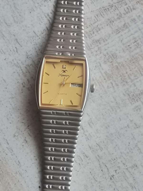 LADIES HOSAM STAINLESS STEEL WATCH WITH DAY/DATE FUNCTION IN EXCELLENT WORKING CONDITION