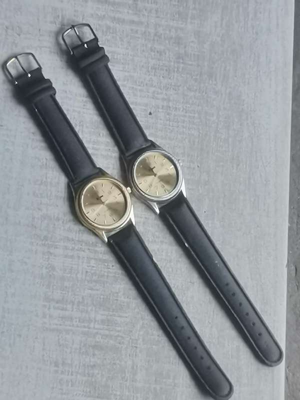 MENS SET OF SUN WATCHES 1 SILVER AND 1 GOLD BOTH IN EXCELLENT WORKING CONDITION - BIDDING FOR BOTH