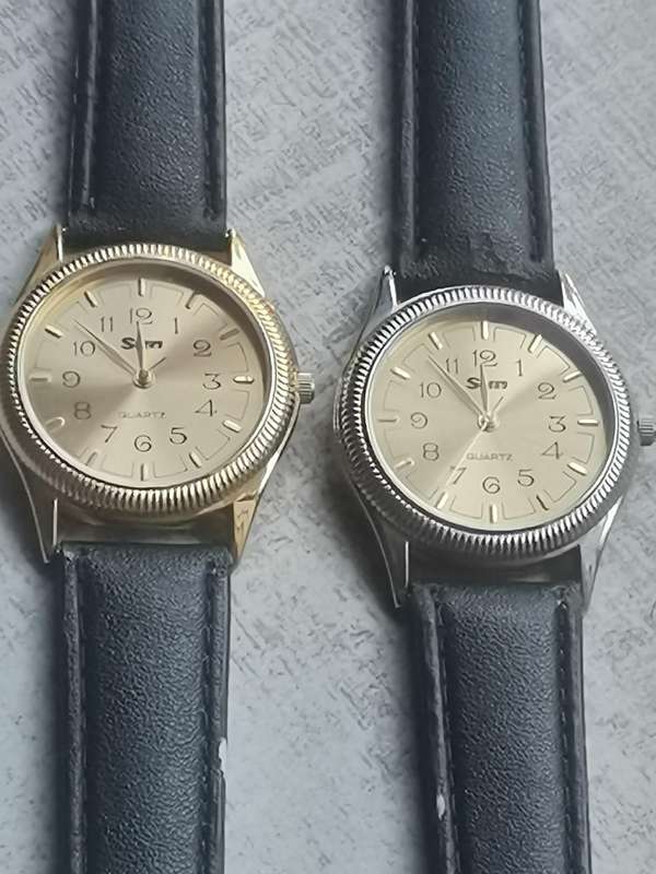 MENS SET OF SUN WATCHES 1 SILVER AND 1 GOLD BOTH IN EXCELLENT WORKING CONDITION - BIDDING FOR BOTH