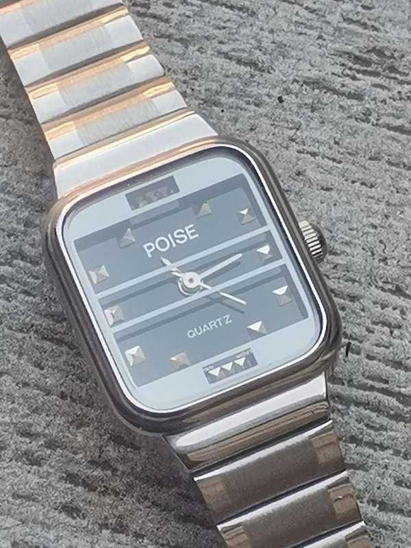 LADIES POISE STAINLESS STEEL WATCH IN EXCELLENT WORKING CONDITION