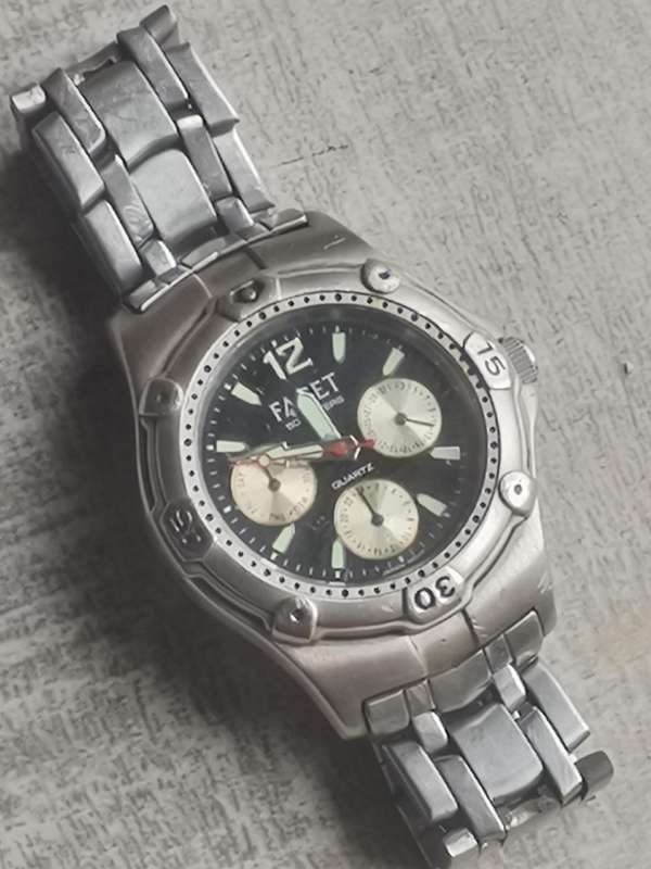 MENS FACET ALL STAINLESS STEEL WATCH IN EXCELLENT WORKING CONDITION