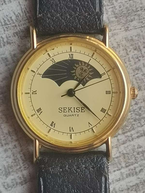 ELEGANT LADIES SEKISE SUN AND MOON WATCH IN EXCELLENT WORKING CONDITION