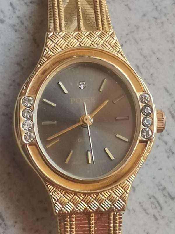 LADIES ALL GOLD PLATED POISE WATCH IN EXCELLENT WORKING CONDITION