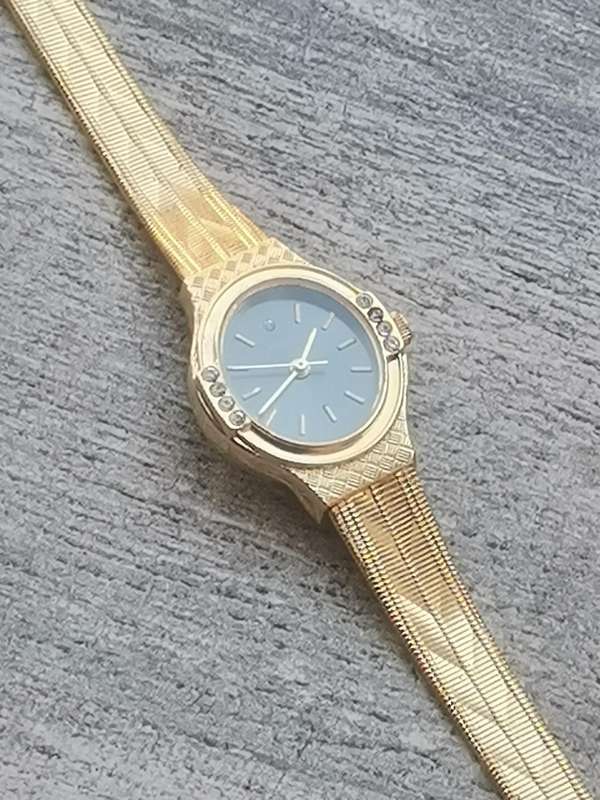 LADIES ALL GOLD PLATED POISE WATCH IN EXCELLENT WORKING CONDITION