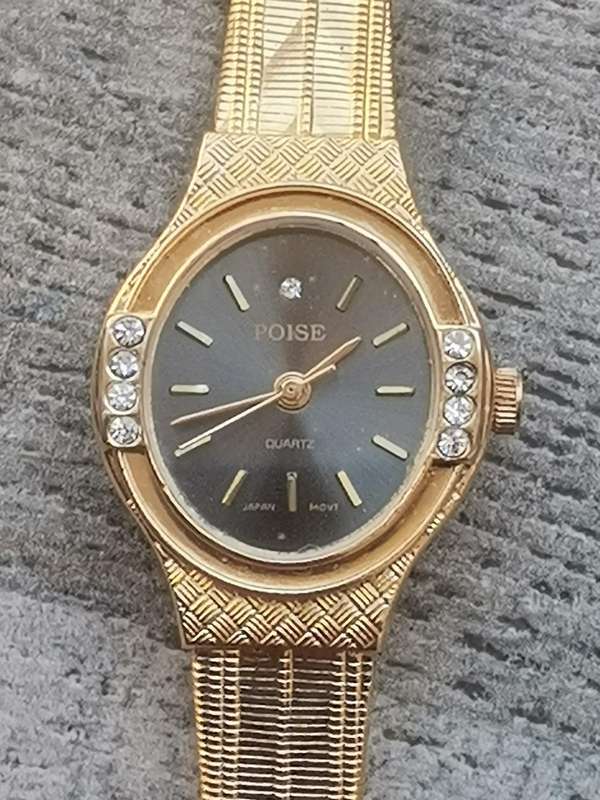 LADIES ALL GOLD PLATED POISE WATCH IN EXCELLENT WORKING CONDITION