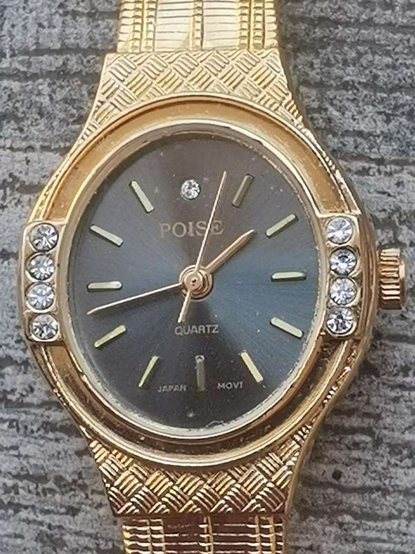 LADIES ALL GOLD PLATED POISE WATCH IN EXCELLENT WORKING CONDITION