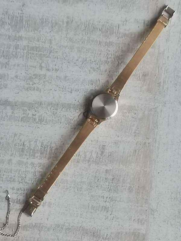 LADIES ALL GOLD PLATED POISE WATCH IN EXCELLENT WORKING CONDITION