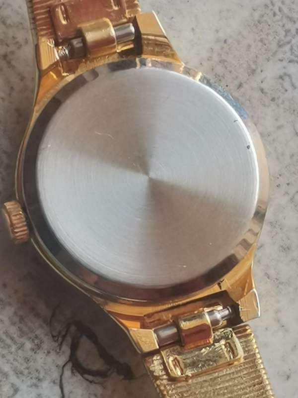 LADIES ALL GOLD PLATED POISE WATCH IN EXCELLENT WORKING CONDITION