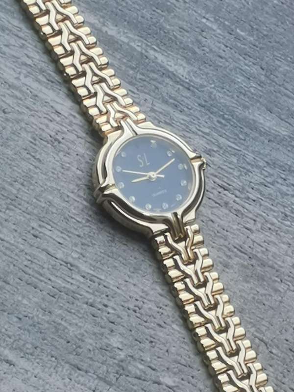 LADIES STL 18K GOLD PLATED WATCH IN EXCELLENT WORKING CONDITION