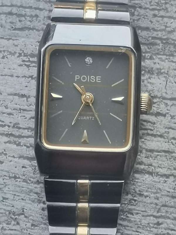 STUNNING LADIES POISE BLACK AND GOLD WATCH IN EXCELLENT WORKING CONDITION