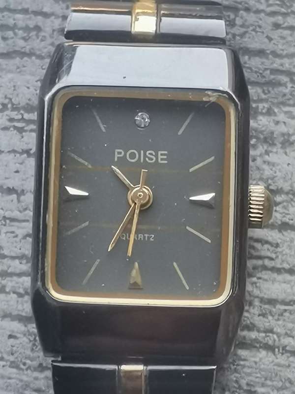 STUNNING LADIES POISE BLACK AND GOLD WATCH IN EXCELLENT WORKING CONDITION