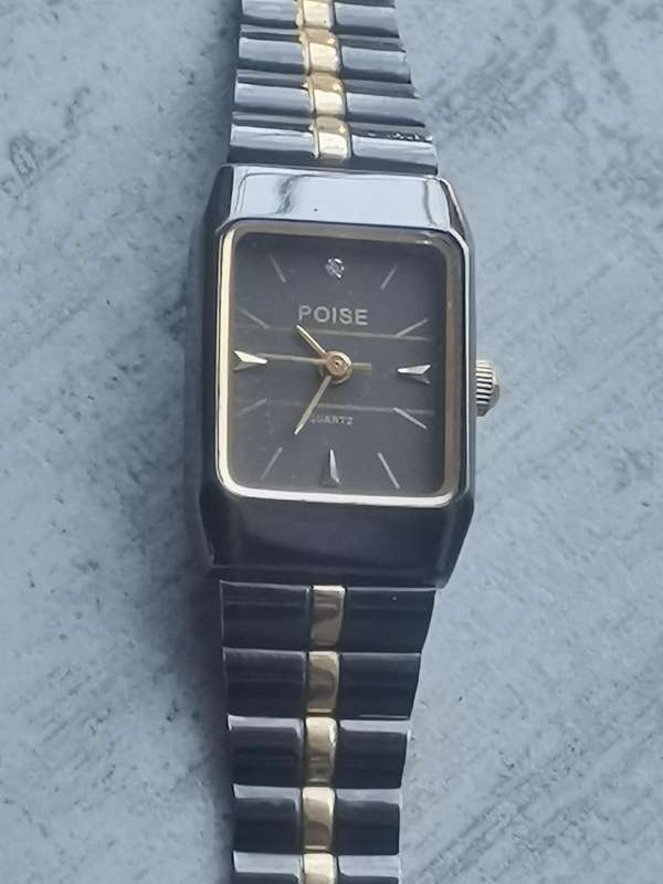 STUNNING LADIES POISE BLACK AND GOLD WATCH IN EXCELLENT WORKING CONDITION