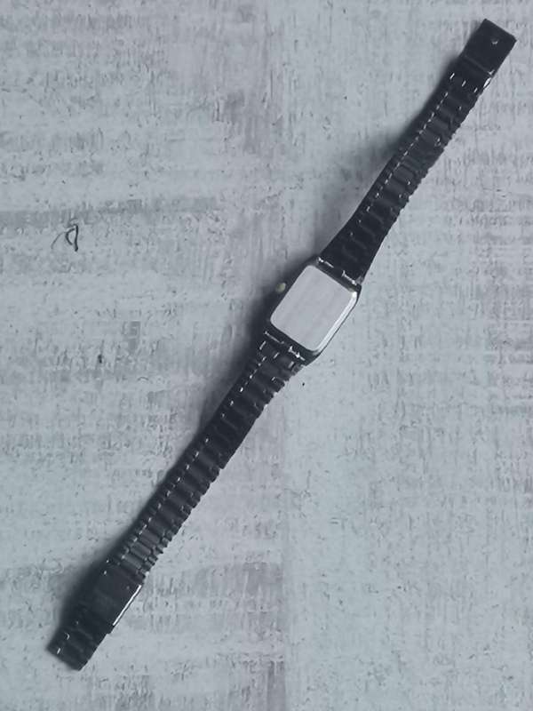 STUNNING LADIES POISE BLACK AND GOLD WATCH IN EXCELLENT WORKING CONDITION