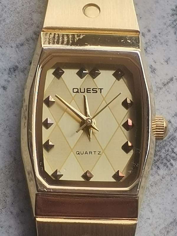LADIES GOLD QUEST WATCH IN EXCELLENT WORKING CONDITION