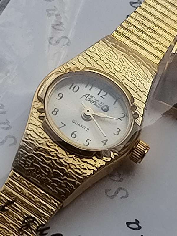 LADIES GOLD WATCH UNWORN STILL IN PLASTIC