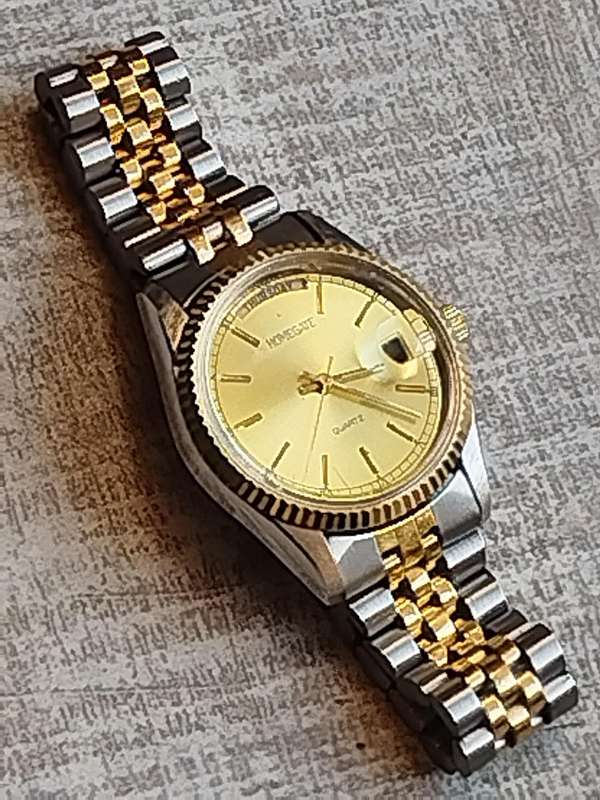 MENS VINTAGE HOMEGATE WATCH IN EXCELLENT WORKING CONDITION