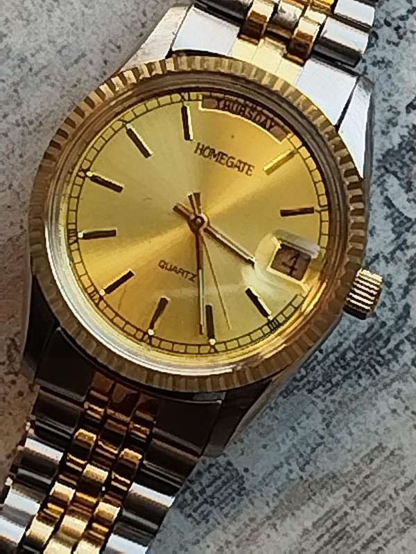 MENS VINTAGE HOMEGATE WATCH IN EXCELLENT WORKING CONDITION