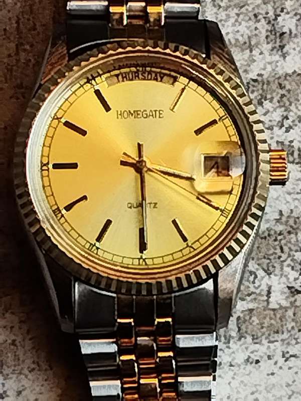 MENS VINTAGE HOMEGATE WATCH IN EXCELLENT WORKING CONDITION
