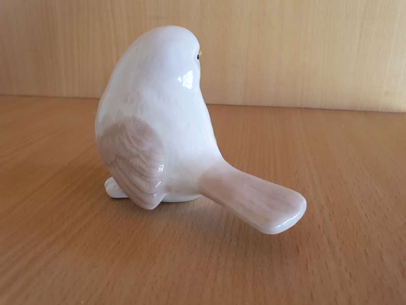 Small Ceramic Bird Figurine   (height 7cm width 10cm depth 5cm)