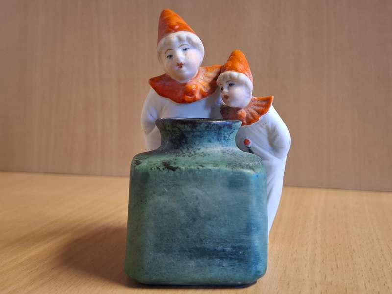 Boys Figurine with Small Vase