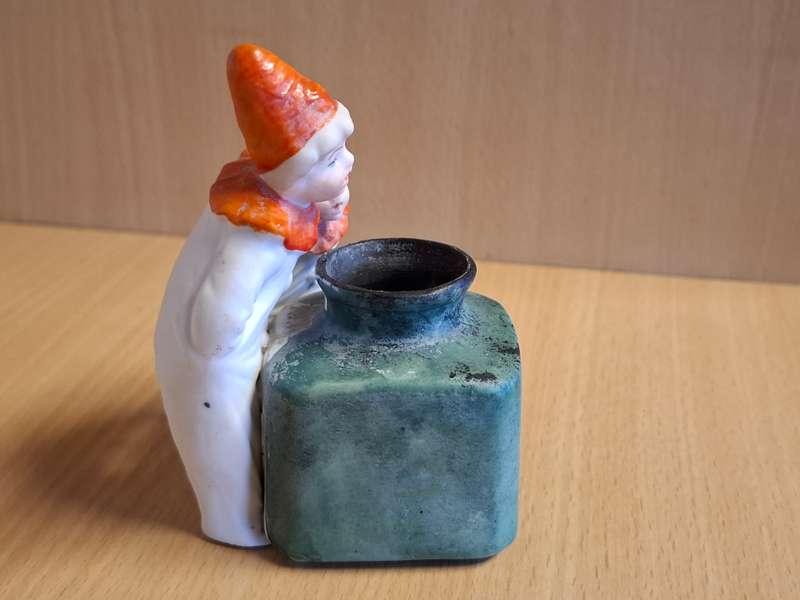 Boys Figurine with Small Vase