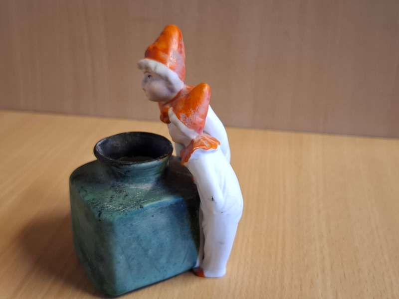Boys Figurine with Small Vase