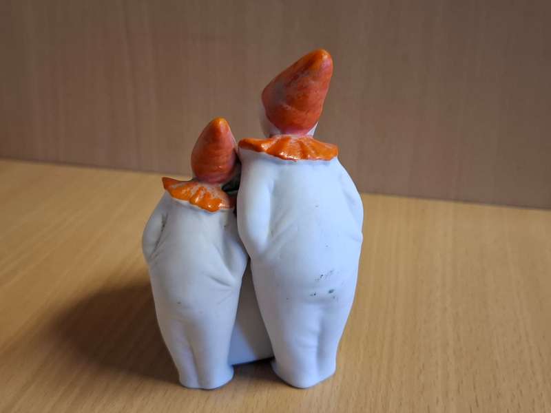 Boys Figurine with Small Vase