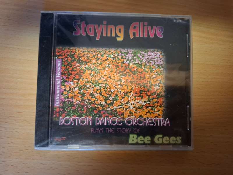 Staying Alive - Boston Dance Orchestra Plays The Story of Bee Gees  - CD (New condition)