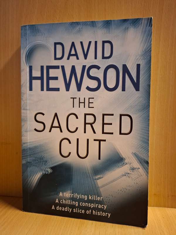 The Sacred Cut: David Hewson  (Paperback)