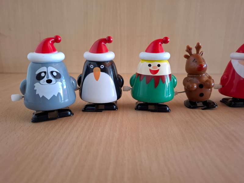 Lot of 7 Wind Up Santa Claus/Christmas Figurines