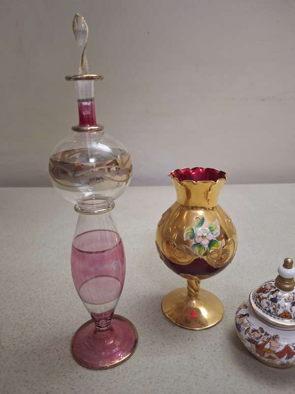 Two perfume bottles one glass venation vase