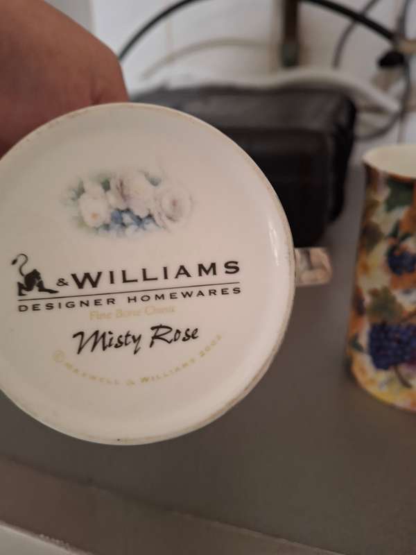 Two maxwell williams procelain mugs