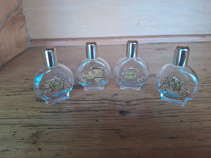 Four nice glass perfume bottles