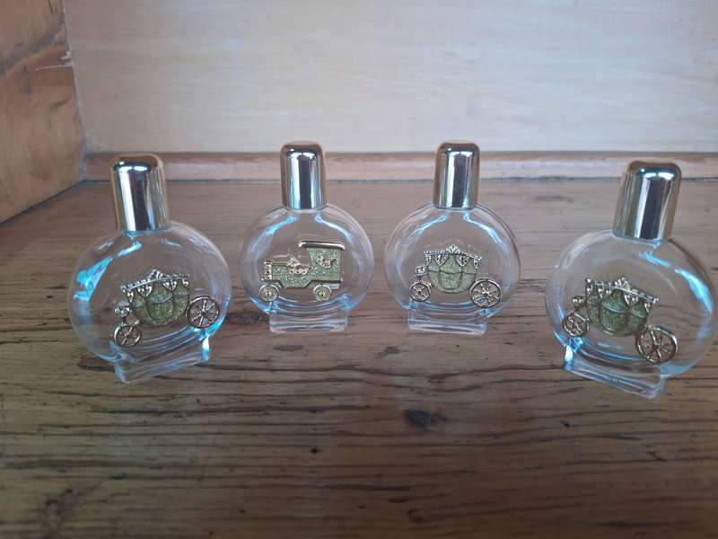 Four nice glass perfume bottles