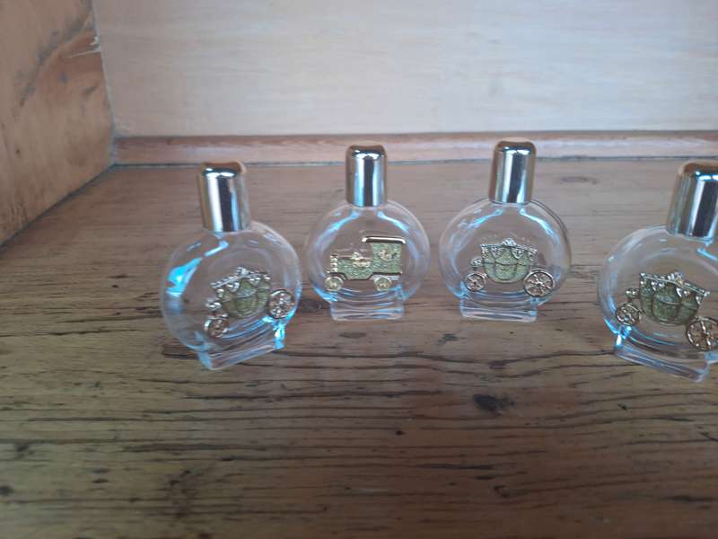 Four nice glass perfume bottles