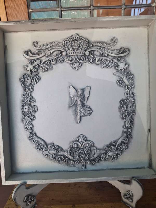 Framed wooden fairy picture on stand