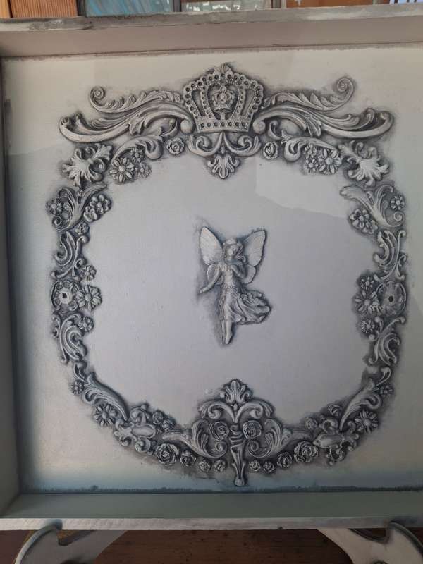 Framed wooden fairy picture on stand