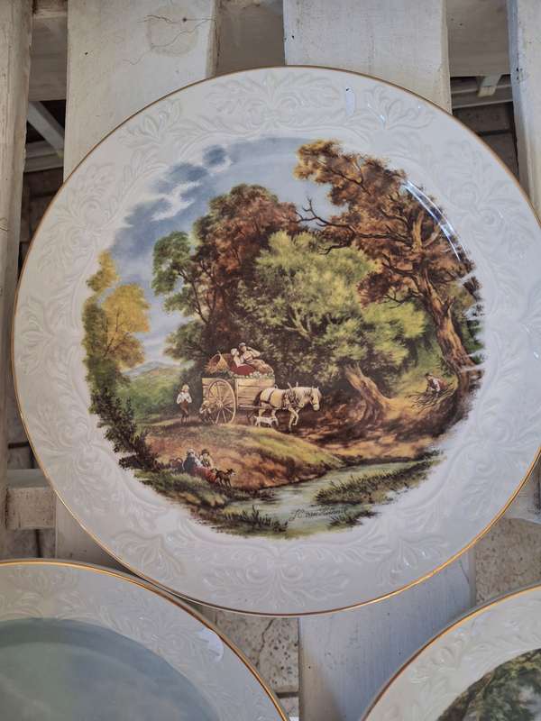 A set of three collectable wood and sons plates