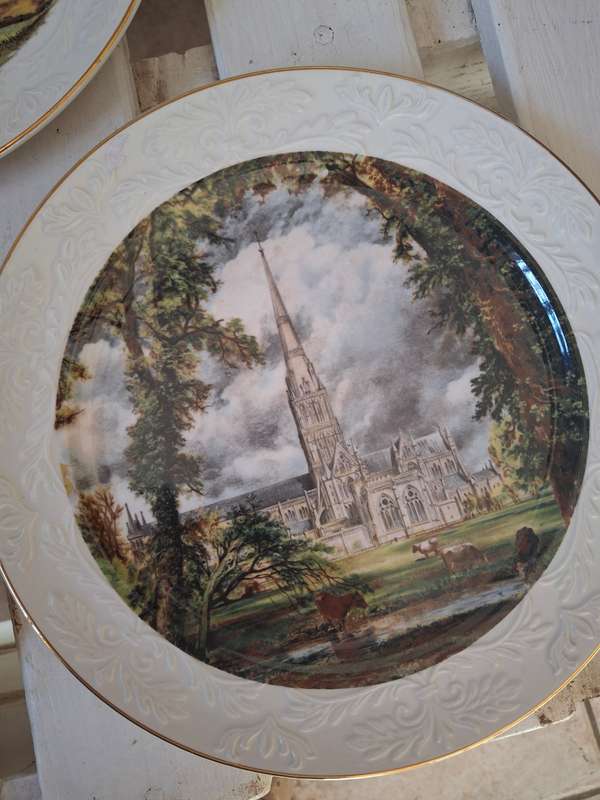 A set of three collectable wood and sons plates