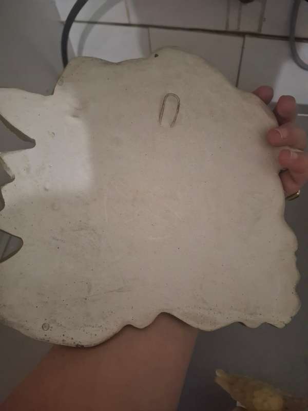 Plaster of paris cherub wall mount