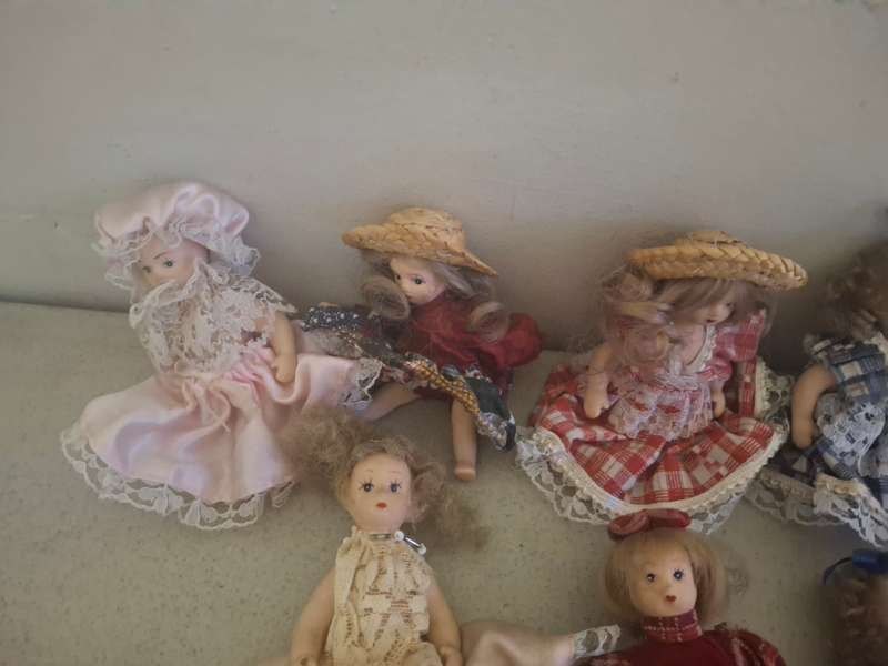 Collection of small procelain dolls