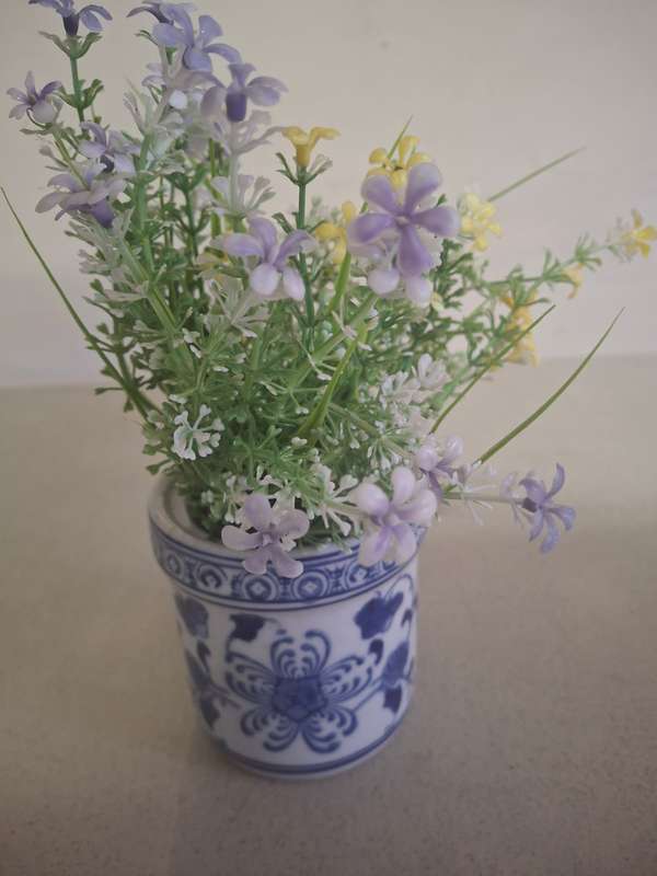 Pretty blue and white holder with flowers